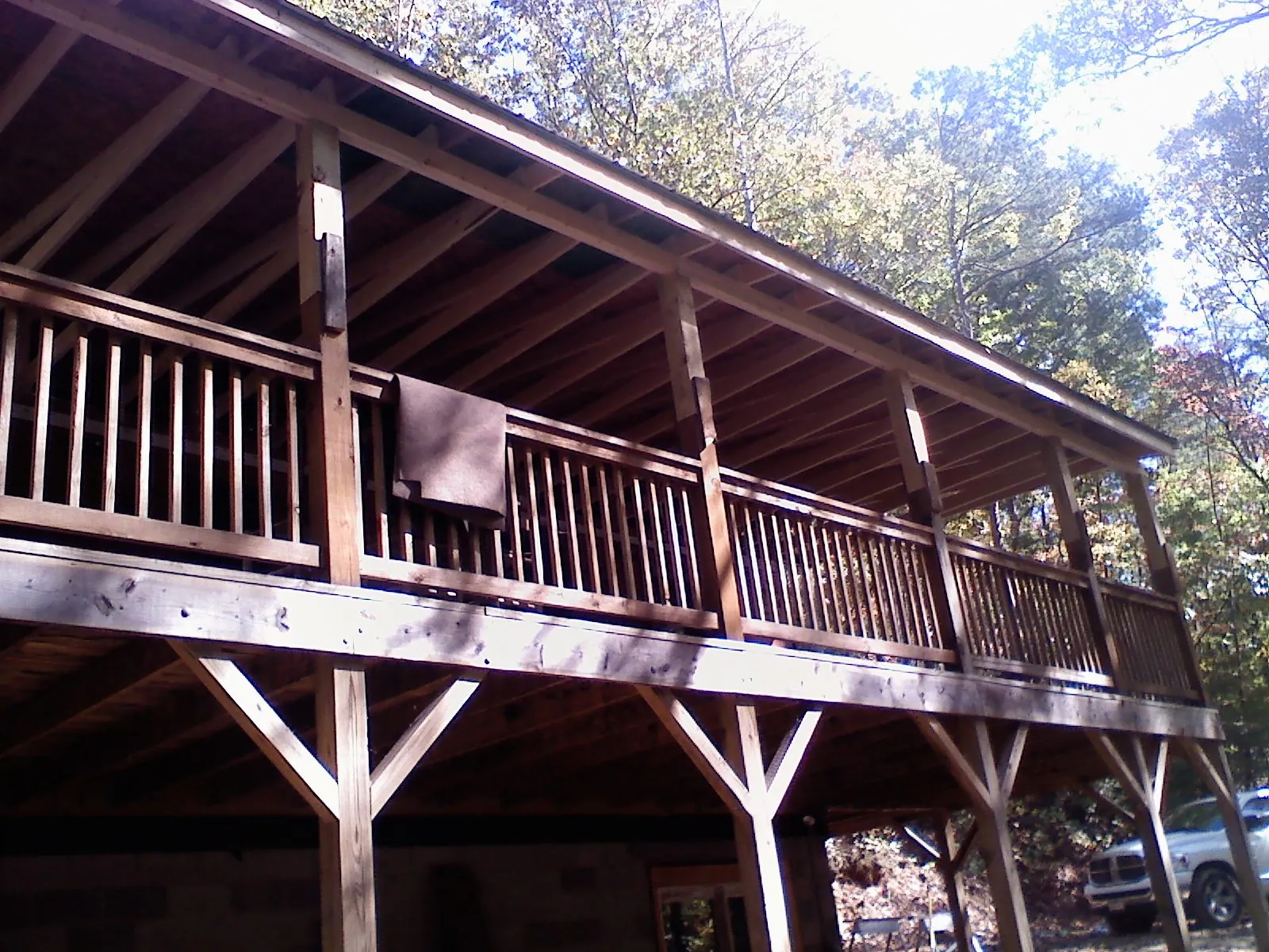 Timber framing under a new elevated porch and deck — Roof Leak Repair in Johnsonburg by Roofing Brothers